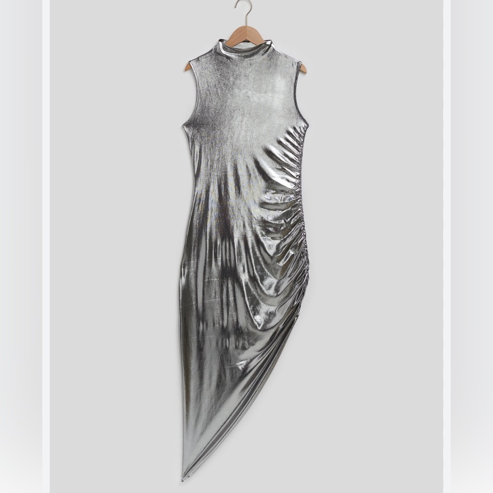 PLUS SIZE. Metallic silver mock neck dress.